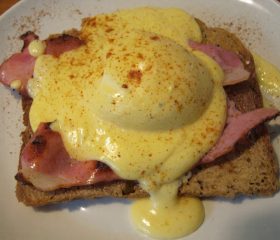 Smothered eggs on toast