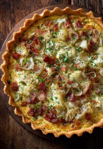 Smoked baon, sour cream and leek tart